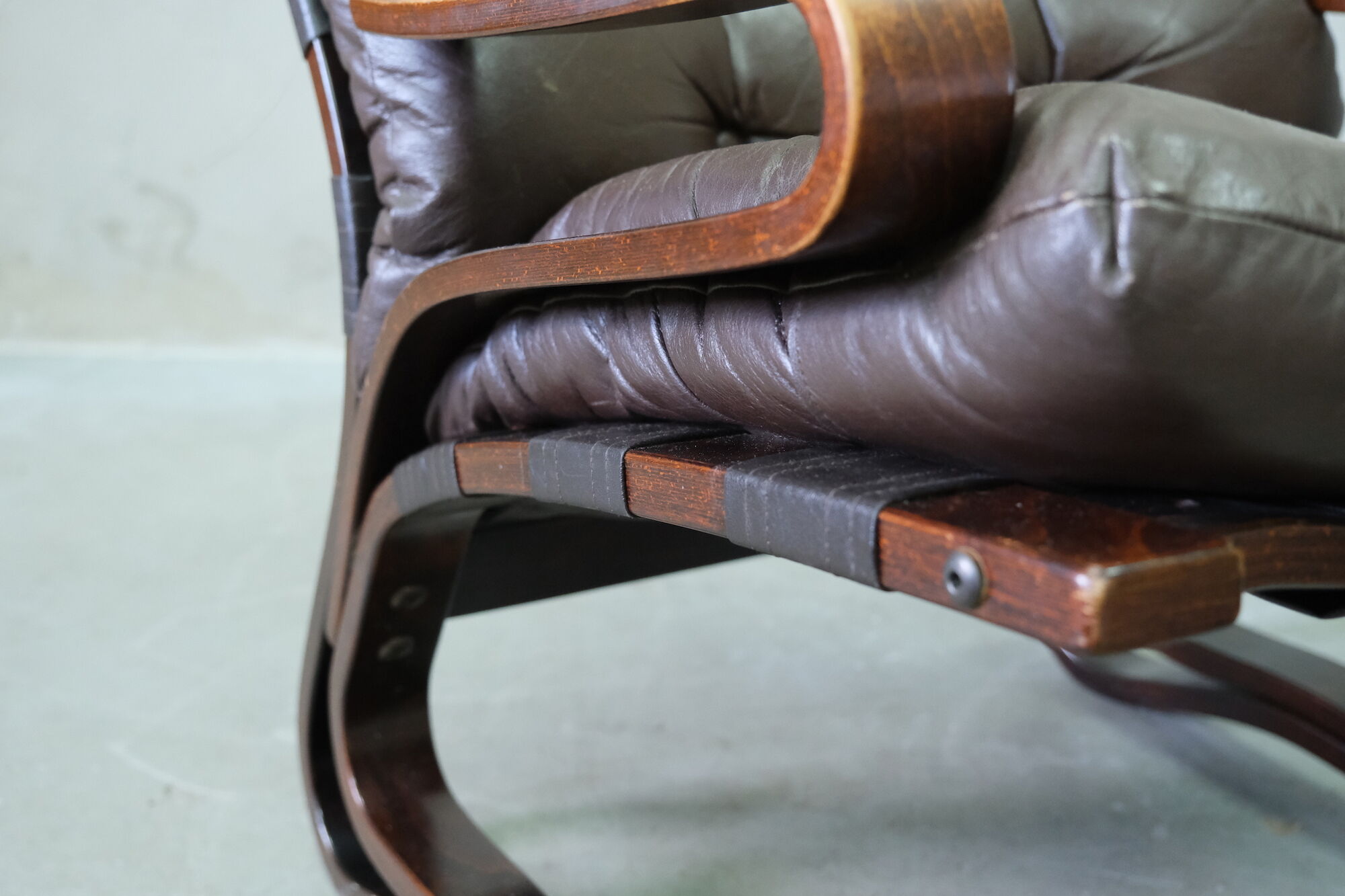 Mid century leather armchair and foot stool by Erda & Nordahl Solheim, Norway 1970's