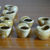 Lot of 12 enamelled sandstone snail shells