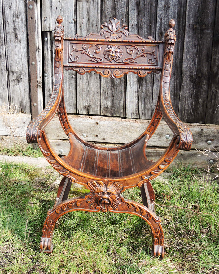 Former curulle chair says dagobert carved wood