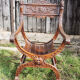Former curulle chair says dagobert carved wood