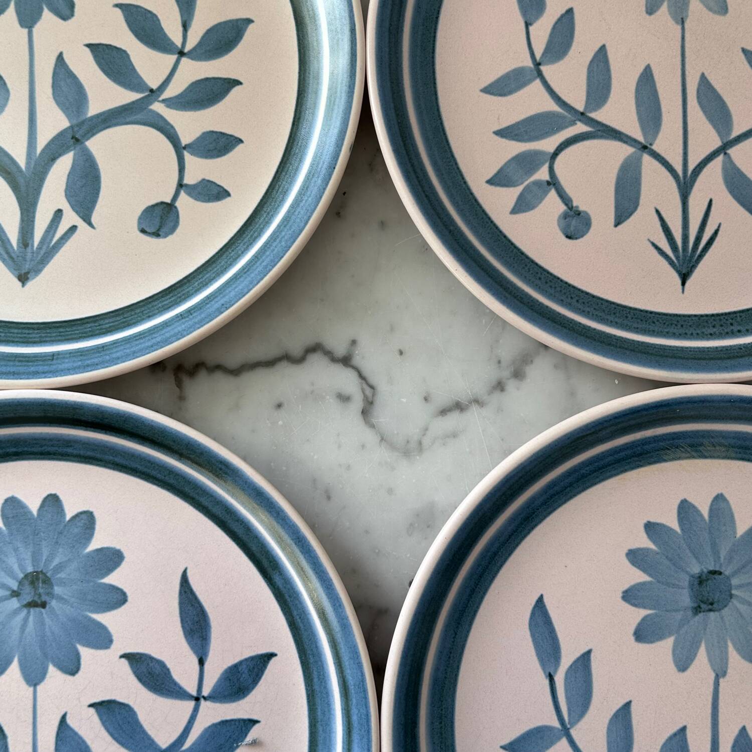 Set of 4 stamped Longchamp plates