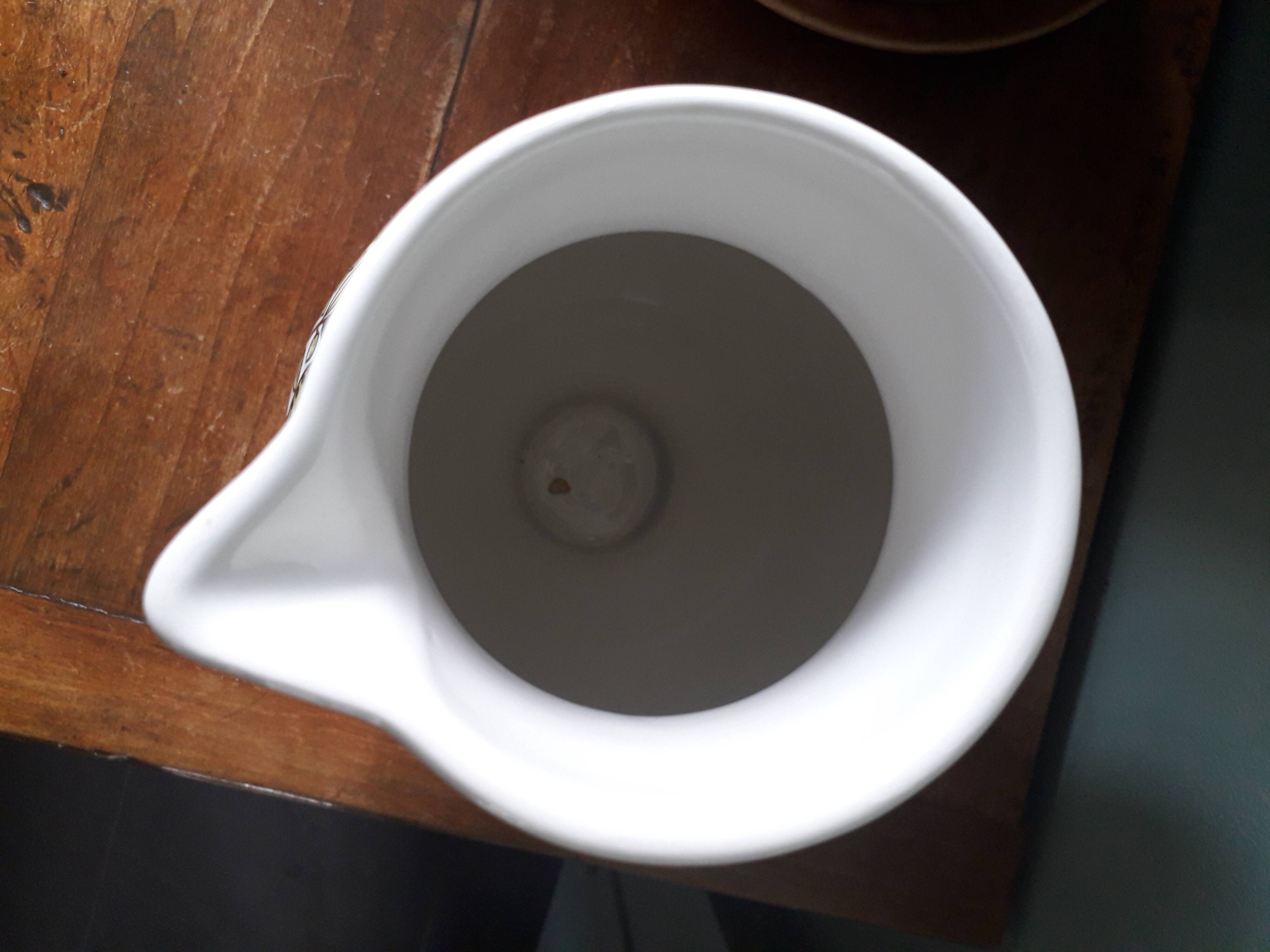 Vintage vase with herbalist pot decor