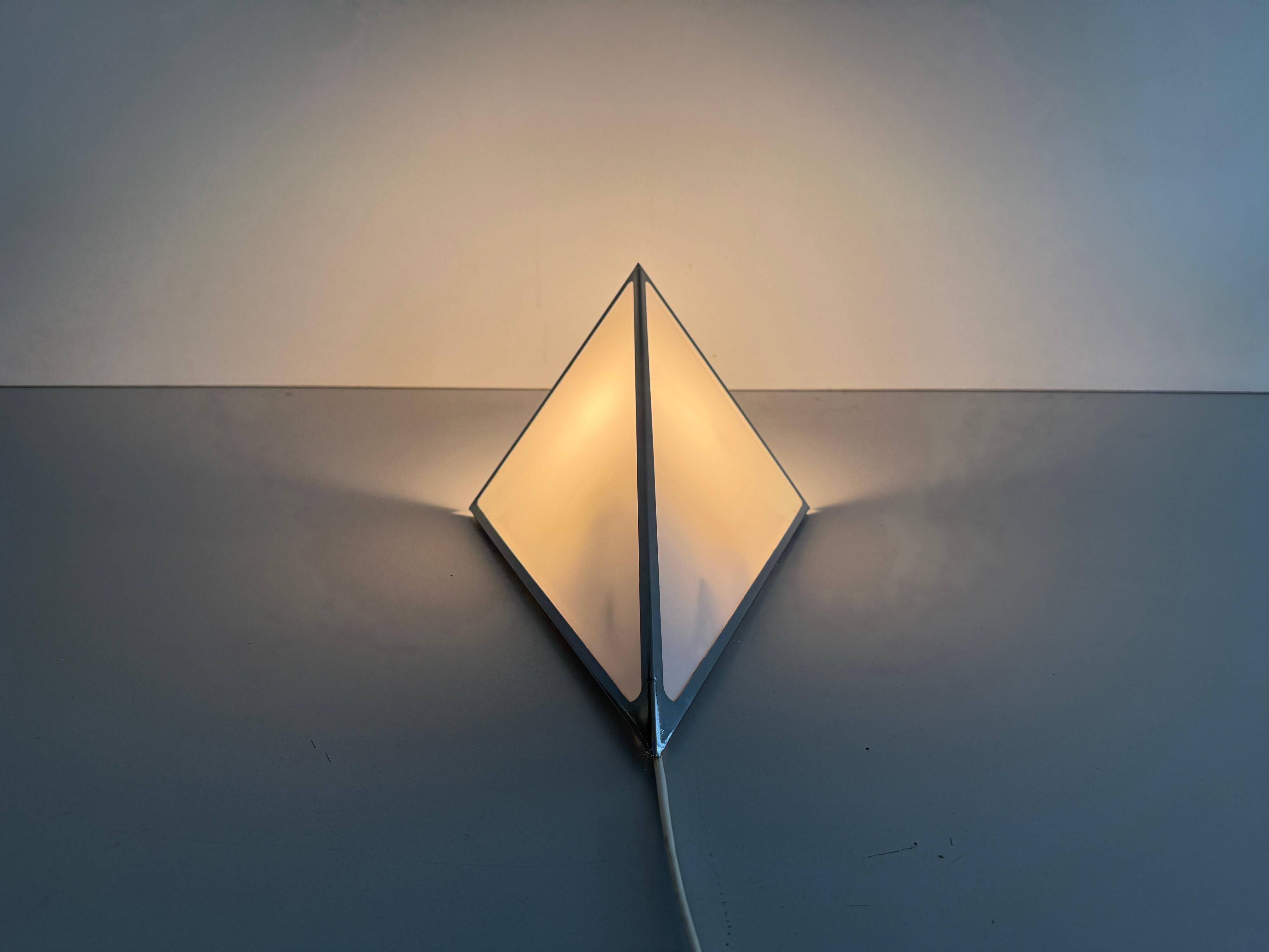 Simple opal glass wall light with an aluminium body, 1980s, Germany.