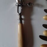 29-piece horn cutlery set, knives and serving utensils.