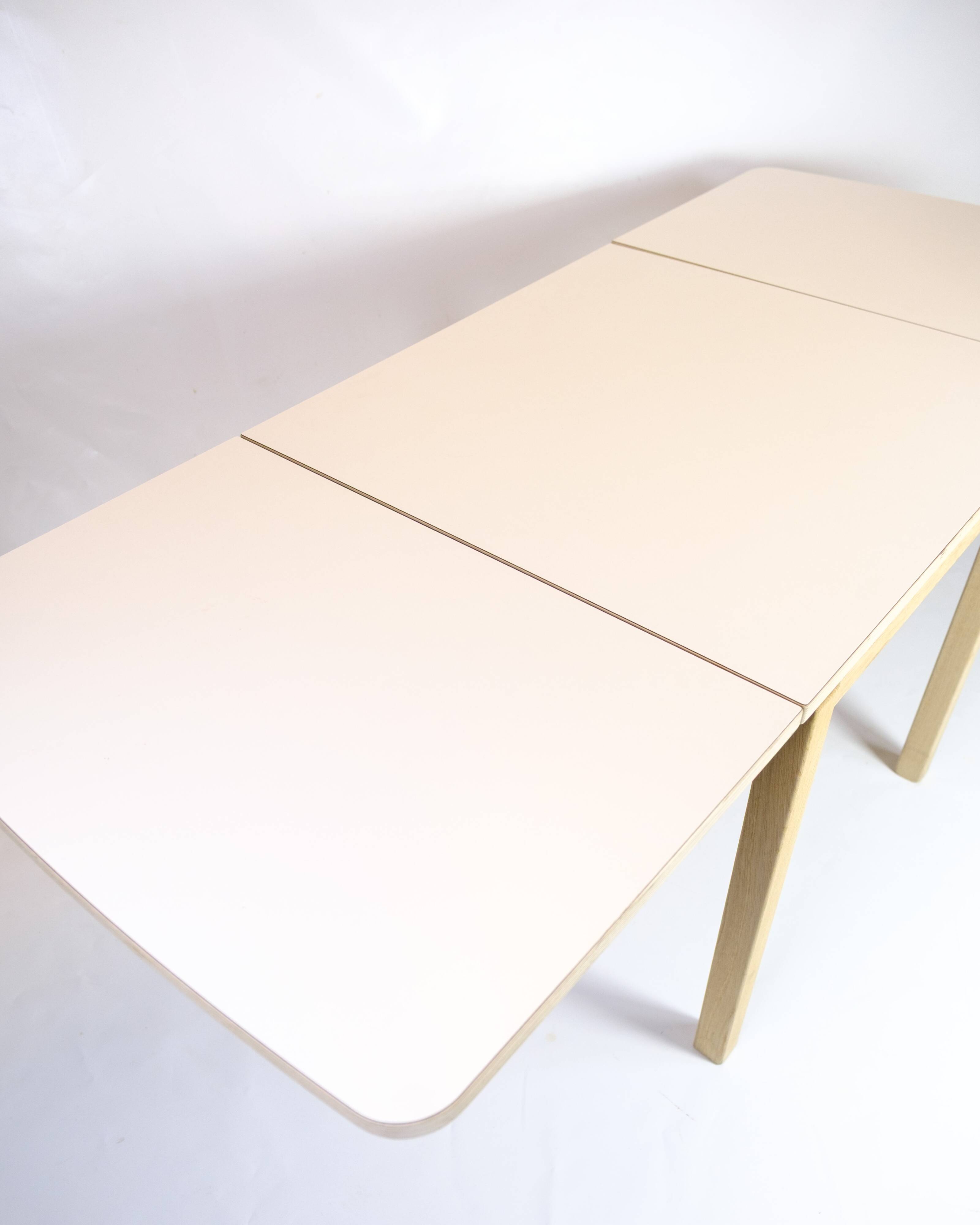 Table with drop leaves - Model 517 - White laminate top - Oak - Haslev Møbelsnedkeri
