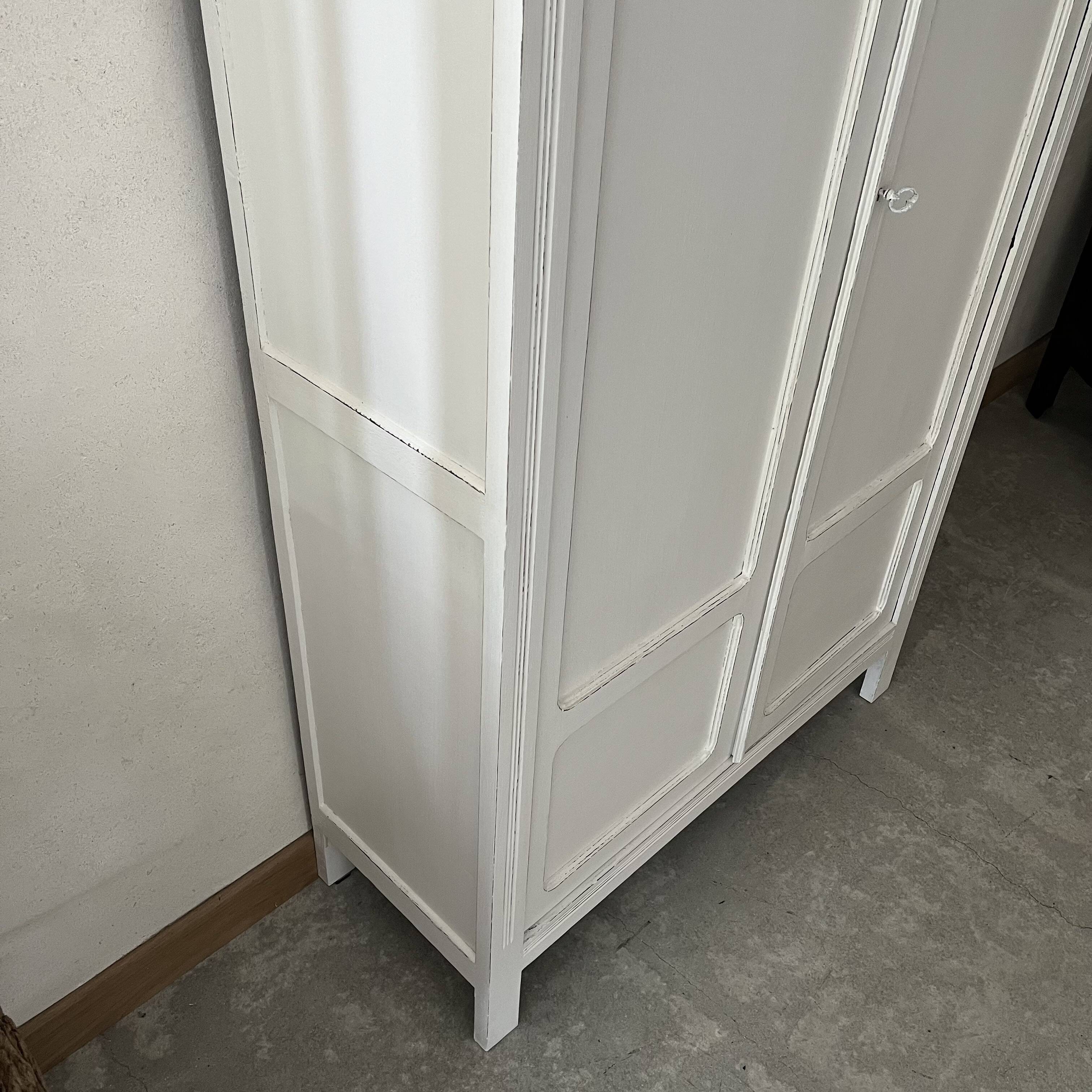 White patinated wardrobe