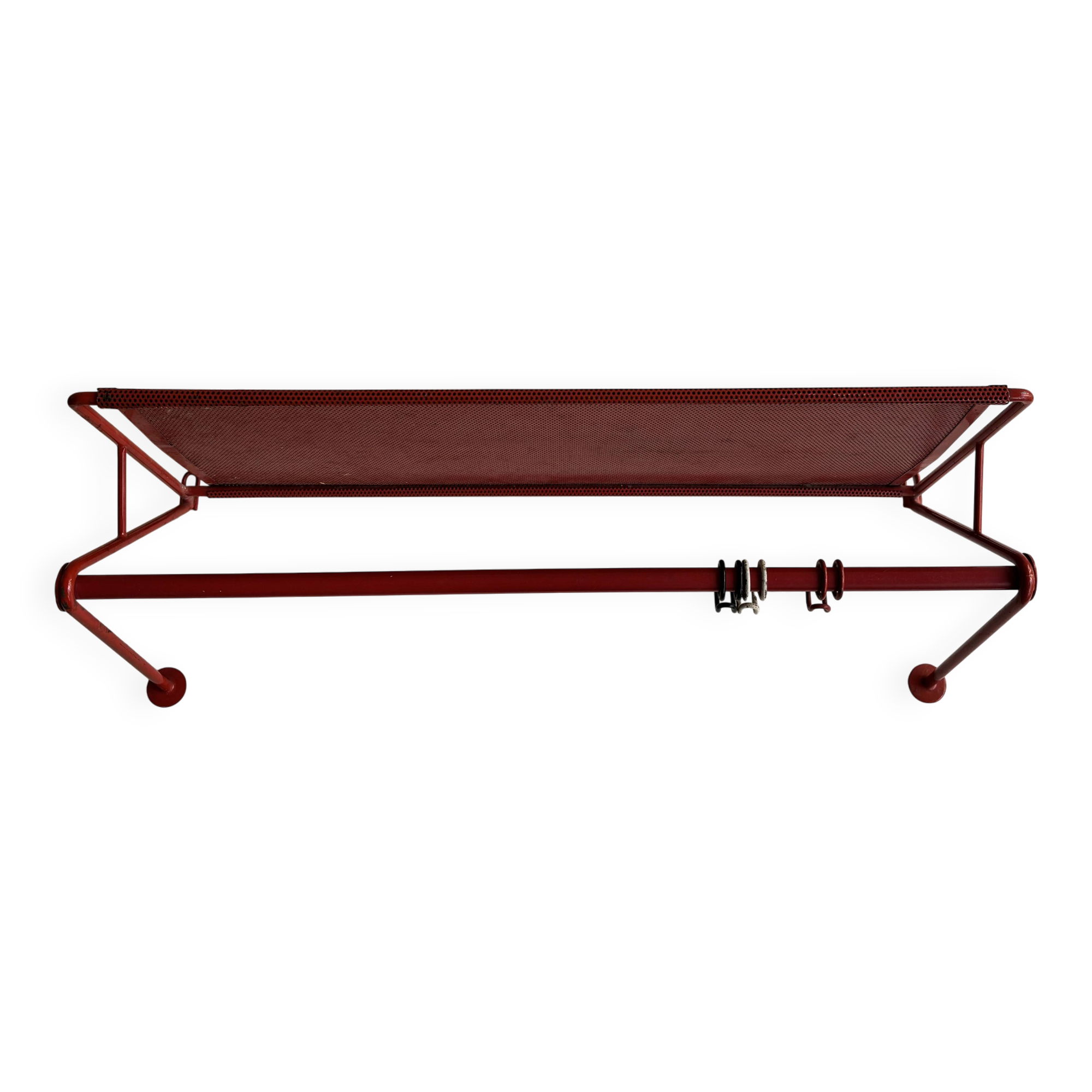 Vintage perforated red metal shelf