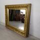 Miroir avec cadre doré