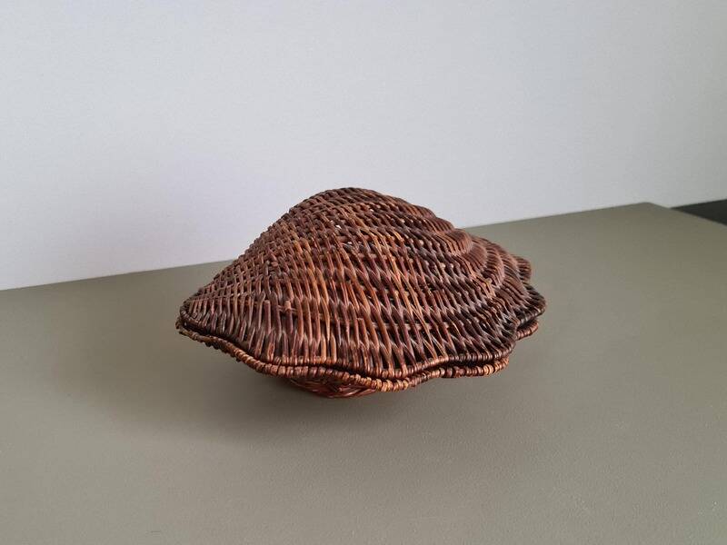 Vintage wicker shell basket, French bohemian decoration.