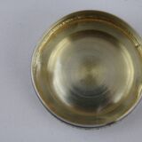 Small round box with silver pills