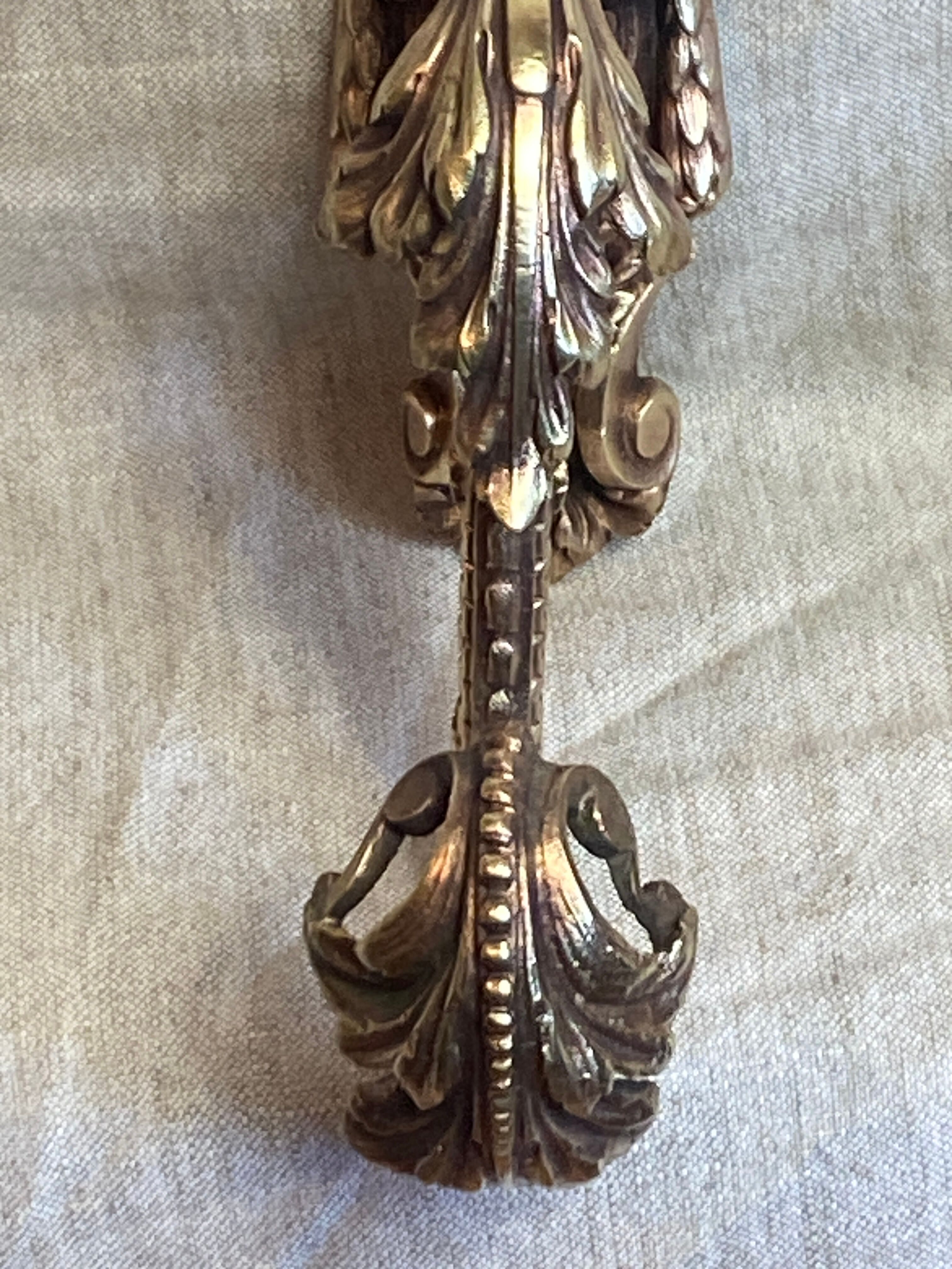 Golden bronze coat hook, 19th century