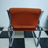Orange chrome frame armchair