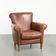 Timeless armchair made of sheepskin leather with a English look