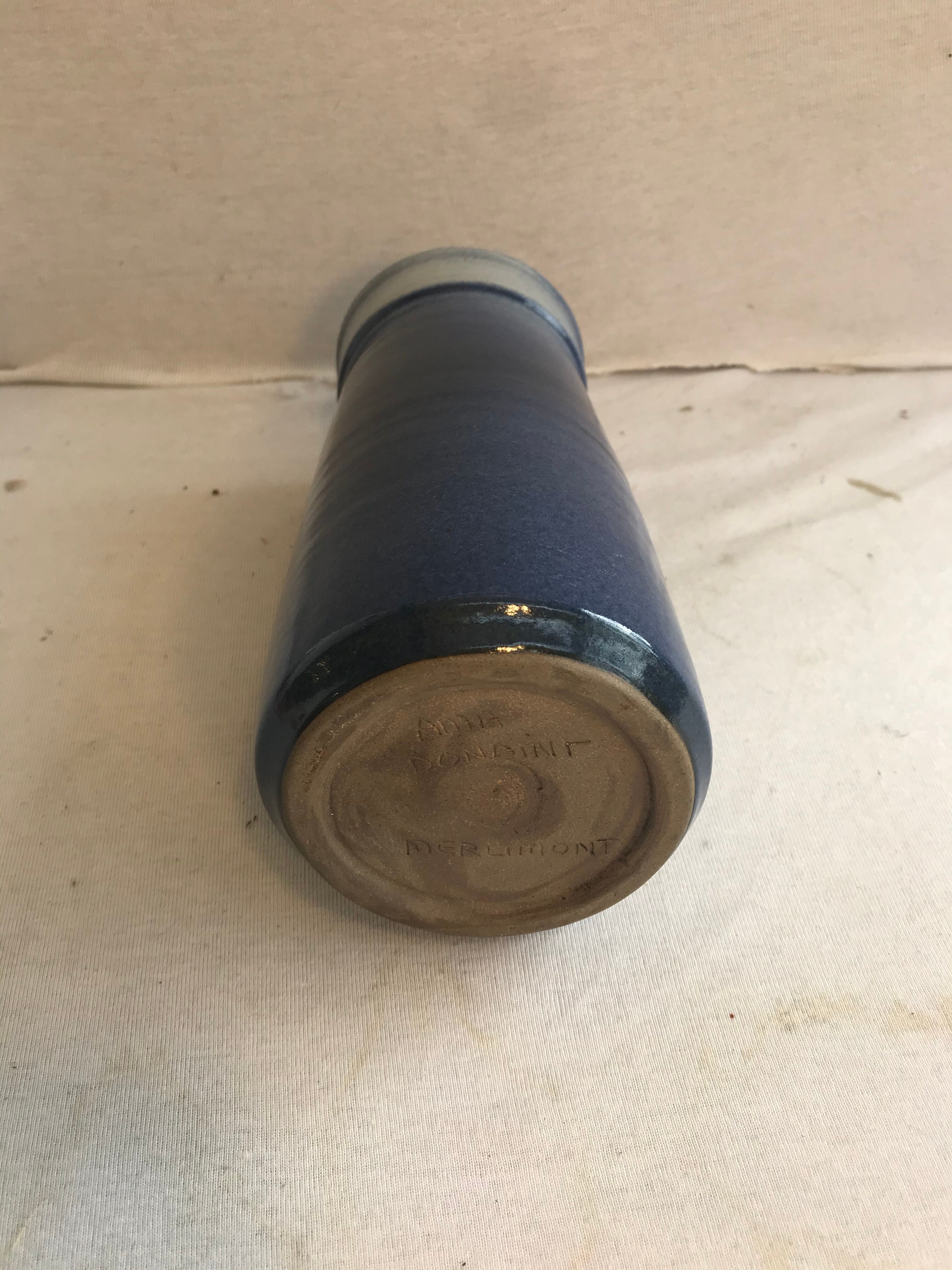 Old roll vase in blue sandstone