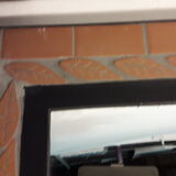 Mirror with terracotta frame