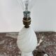 Alabaster lamp, twisted, gadroon decoration, gilded brass base, dolphins