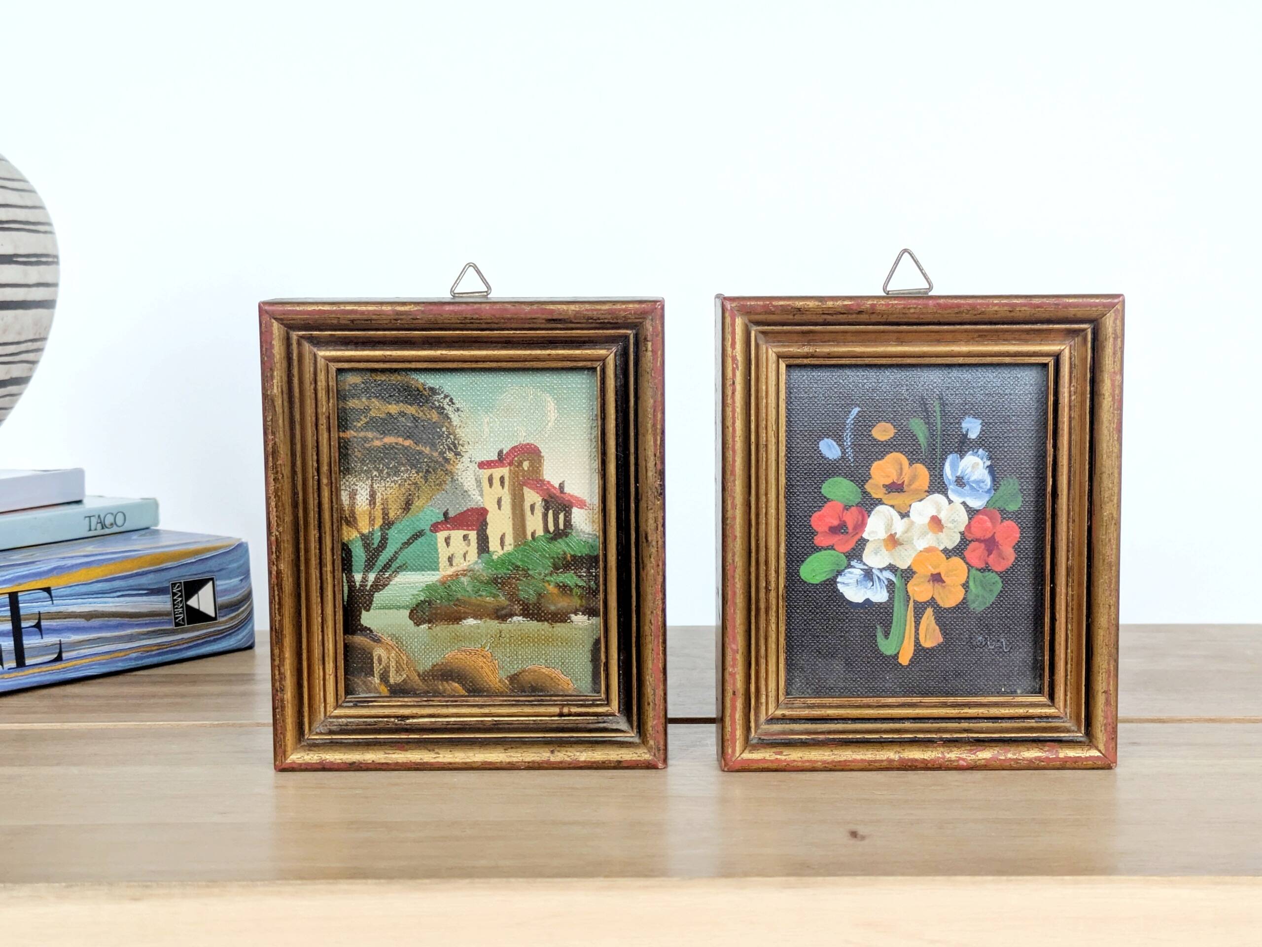 Pair of small Italian oil paintings, flowers and landscape.