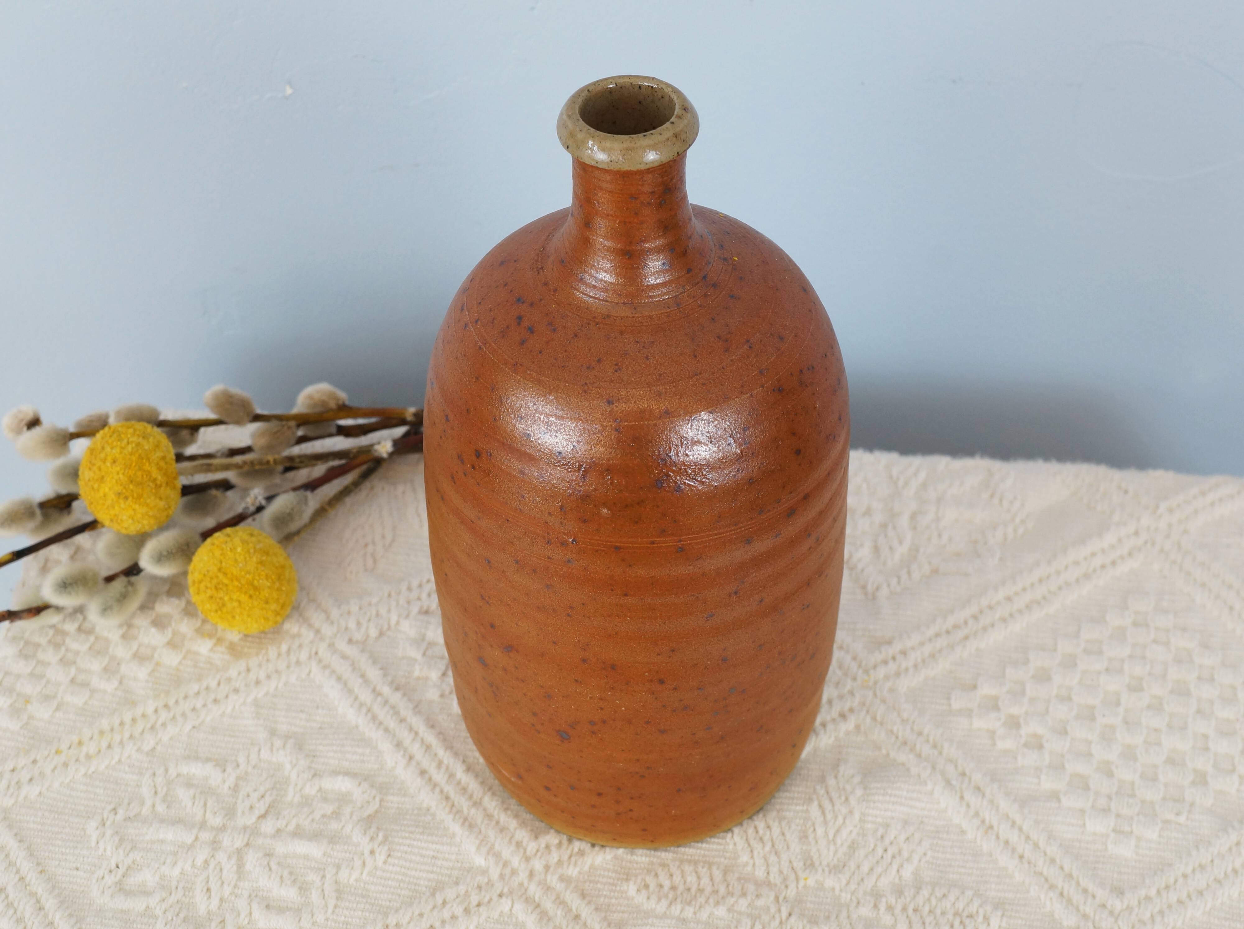 Bottle of vintage stoneware corsican brandy