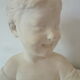 Bust young boy in plaster