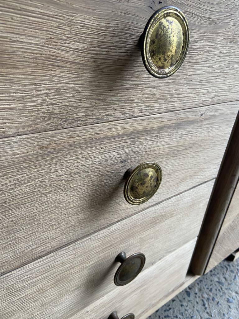 Raw wood chest of drawers with marble top