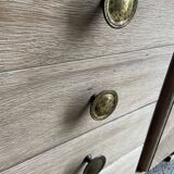 Raw wood chest of drawers with marble top