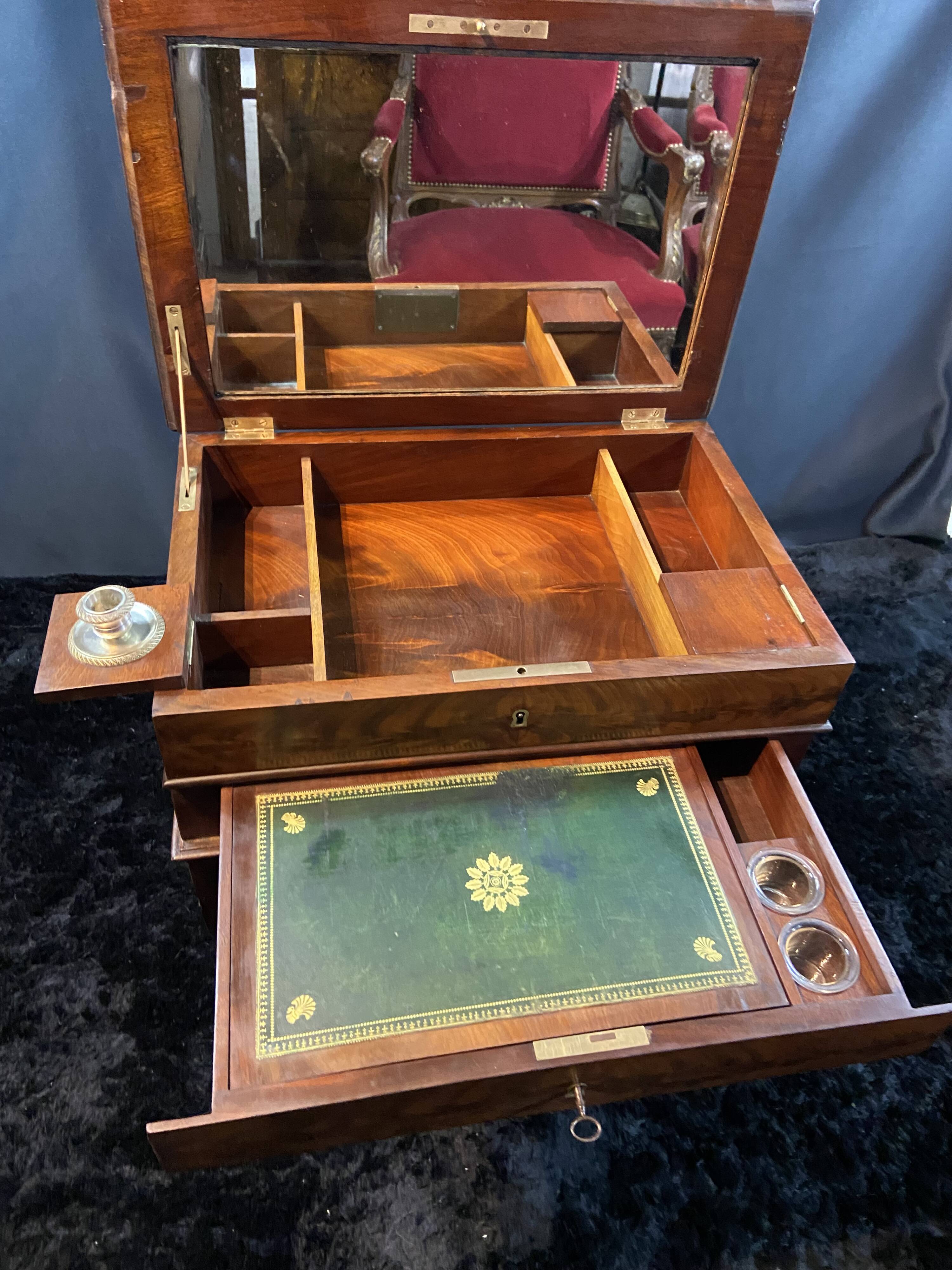 Louis-Philippe period mahogany writing desk with candlestick, 19th century