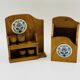 Wall-mounted egg cup holder and wooden utensil holder.
