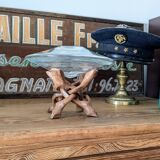 Glass cup molded on carved exotic wood