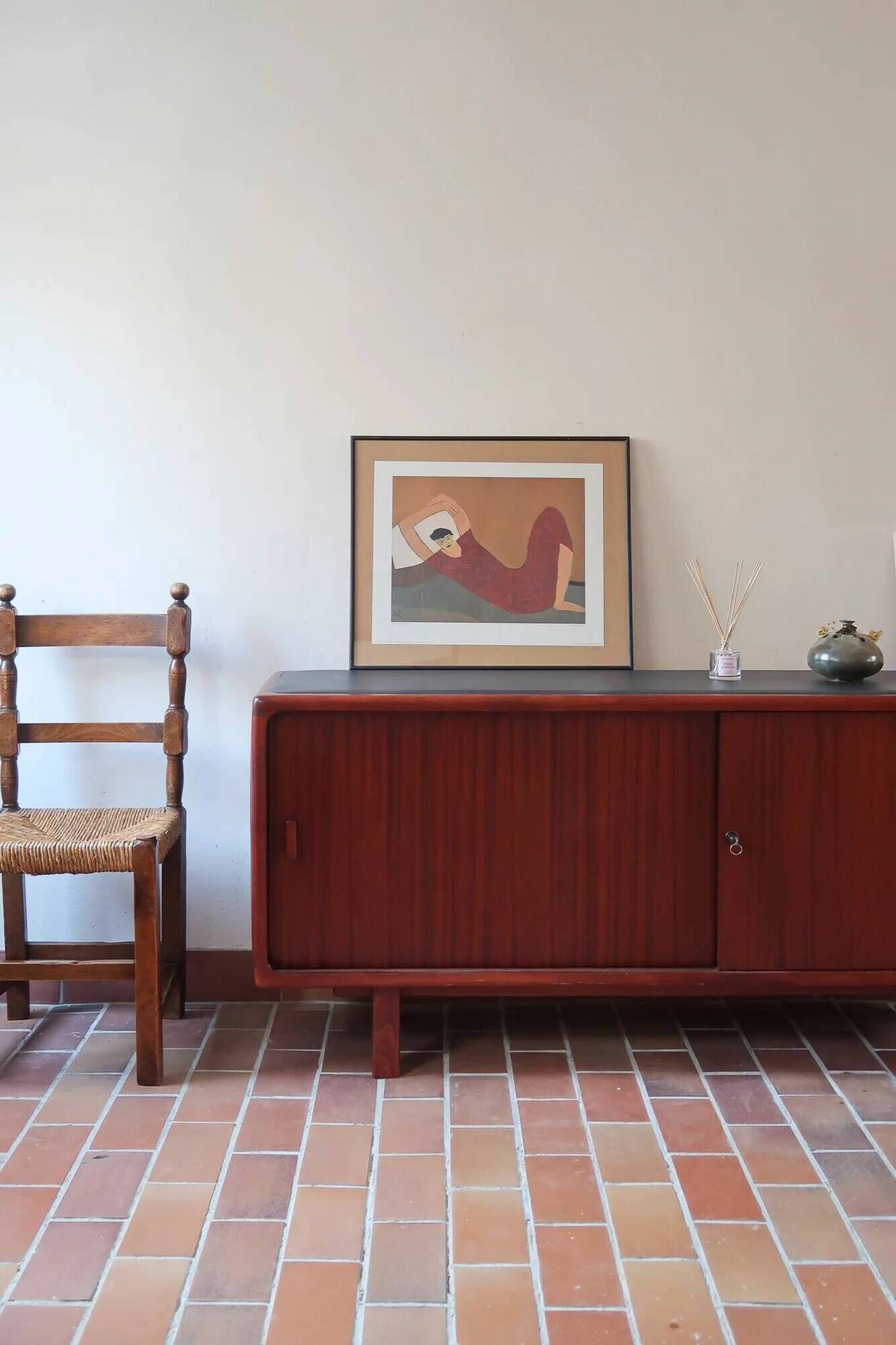 Teak enfilade, sliding doors, black faux leather top, 1970s.