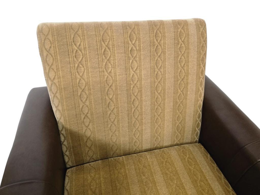 Vintage brown faux leather armchair / retro club chair on wheels