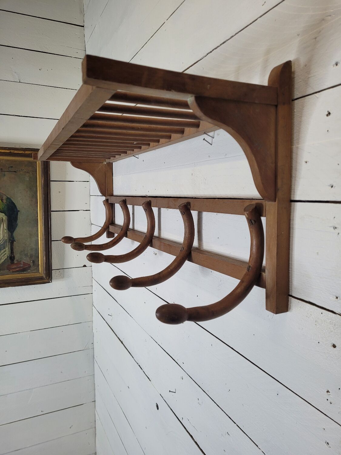 Curved wooden coat rack