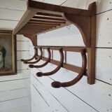 Curved wooden coat rack