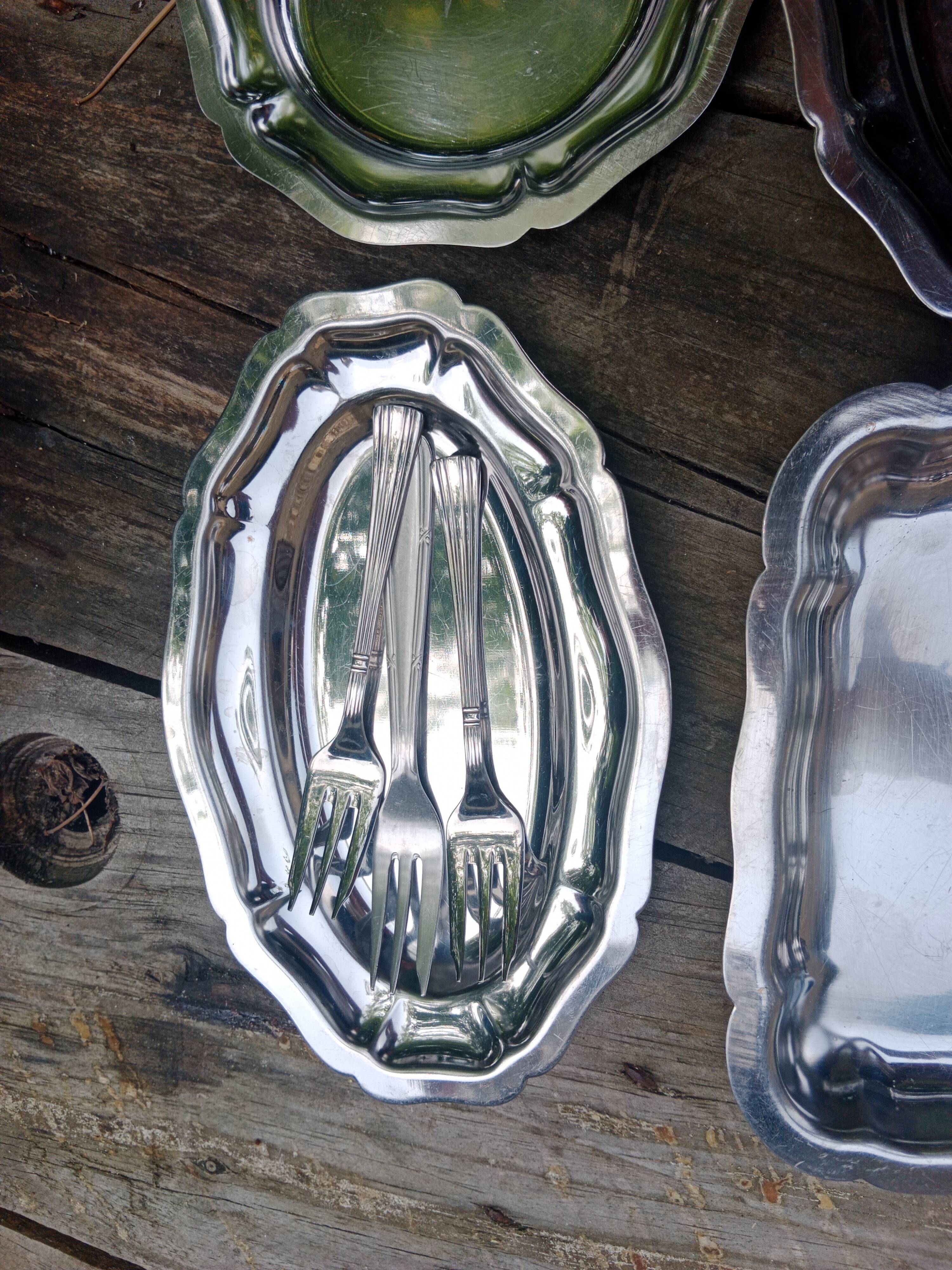 Small vintage platters and presentation forks