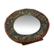 Round mirror in gilded enamelled ceramic with inlay