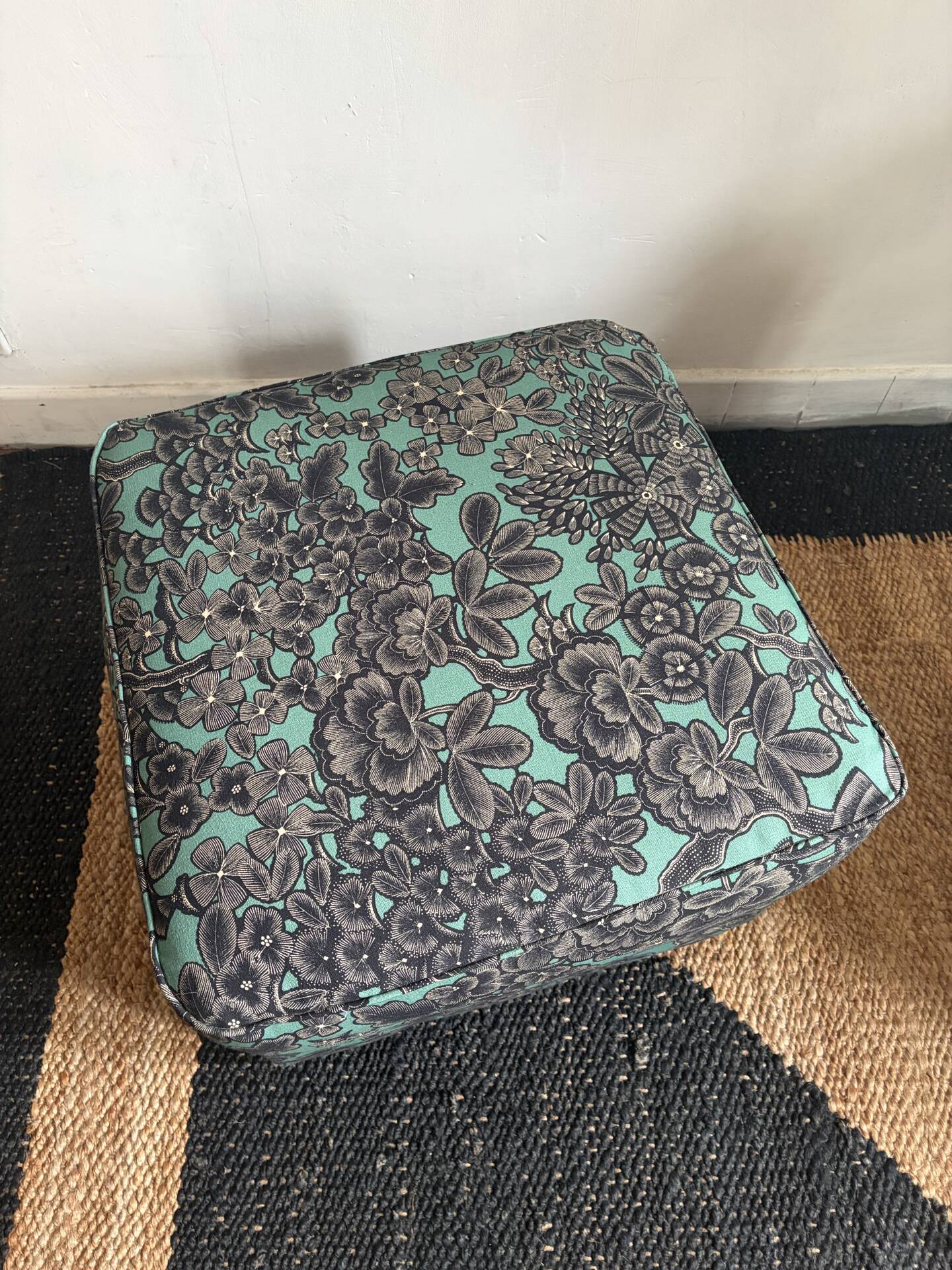 Upholstered pouffe