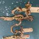 Pair of bronze Art Nouveau wall sconces.