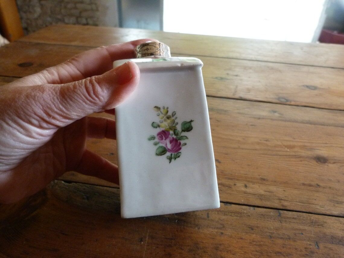 Floral porcelain bathroom bottle with engraved silver cap