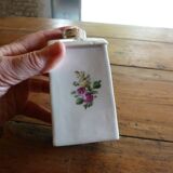 Floral porcelain bathroom bottle with engraved silver cap
