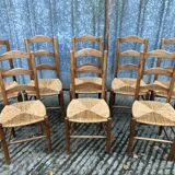 8 Chaises  anciennes vendéennes paillées en cerisier massif.