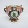 Antique majolica cache-pot with a medallion in Art Nouveau style.