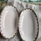 2 porcelain dishes with lions in the French Art Deco style