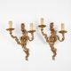 Pair of Louis XV style bronze wall sconces
