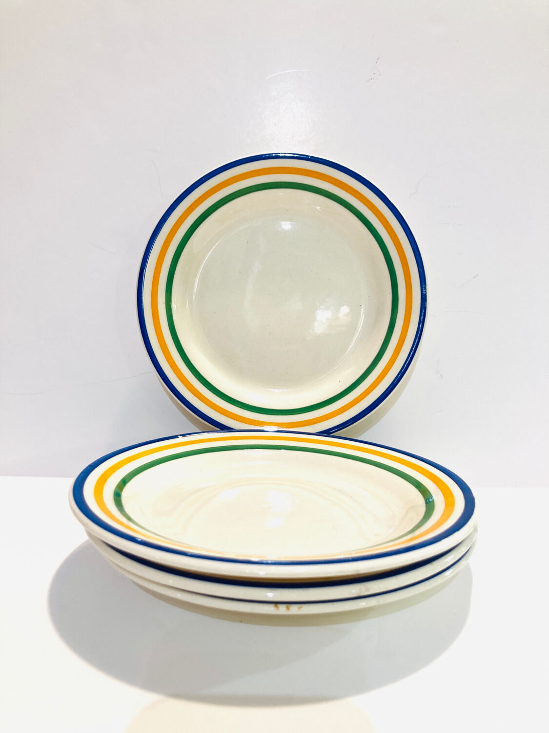 4 striped earthenware plates made in Romania