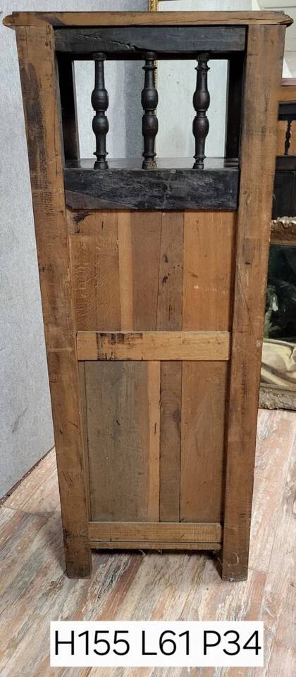 Breton bonnet maker in solid carved oak, 19th century, circa 1850