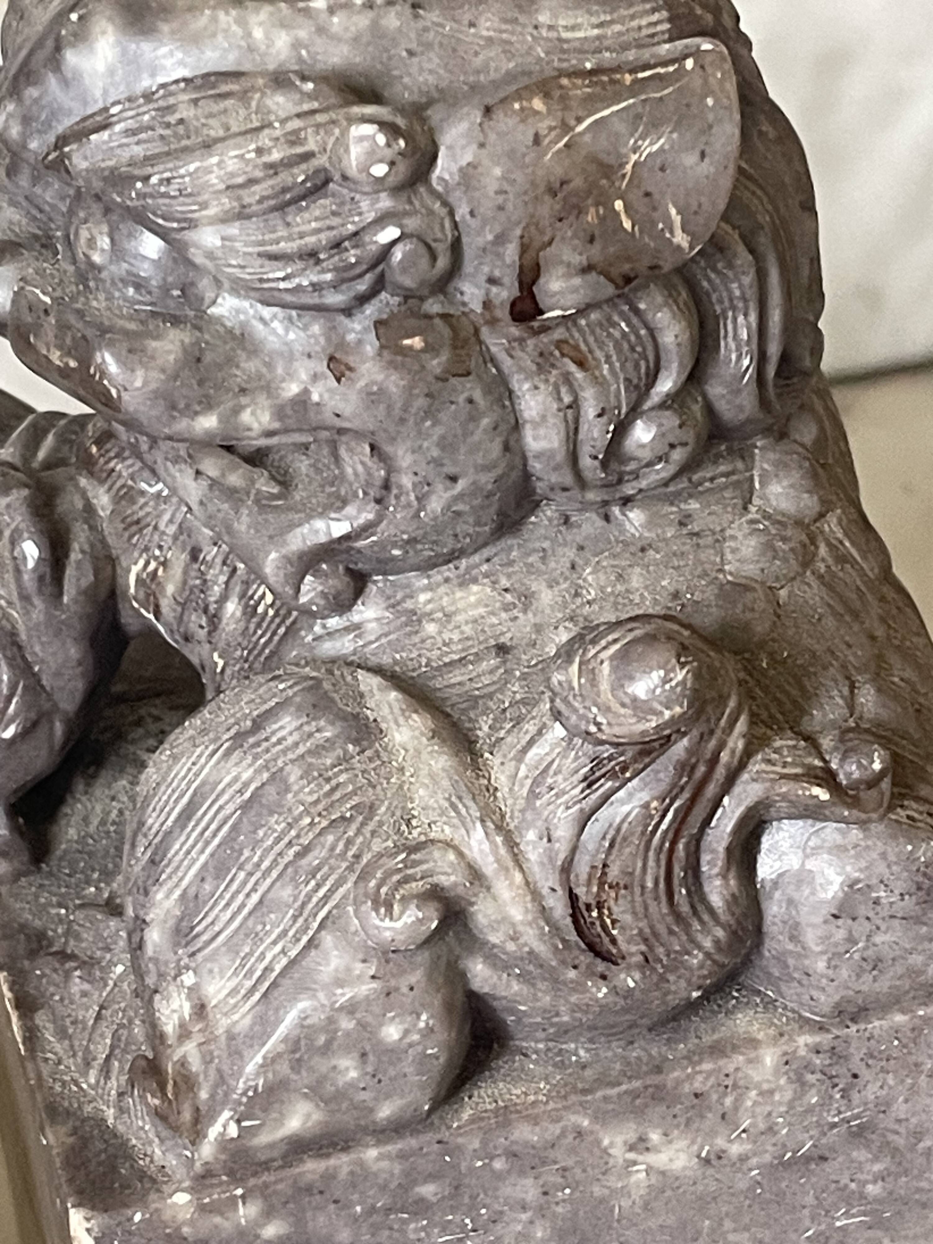 Pair of Foo Dog bookends in sculpted steatite.