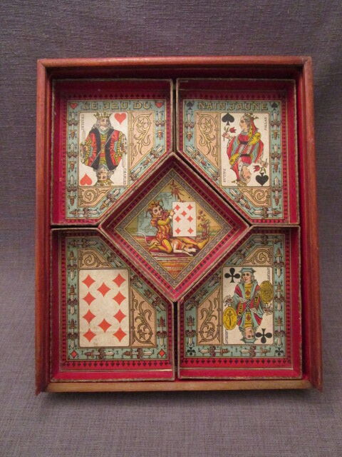 Old yellow dwarf set in wooden-tokens in colored bones