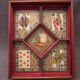 Old yellow dwarf set in wooden-tokens in colored bones