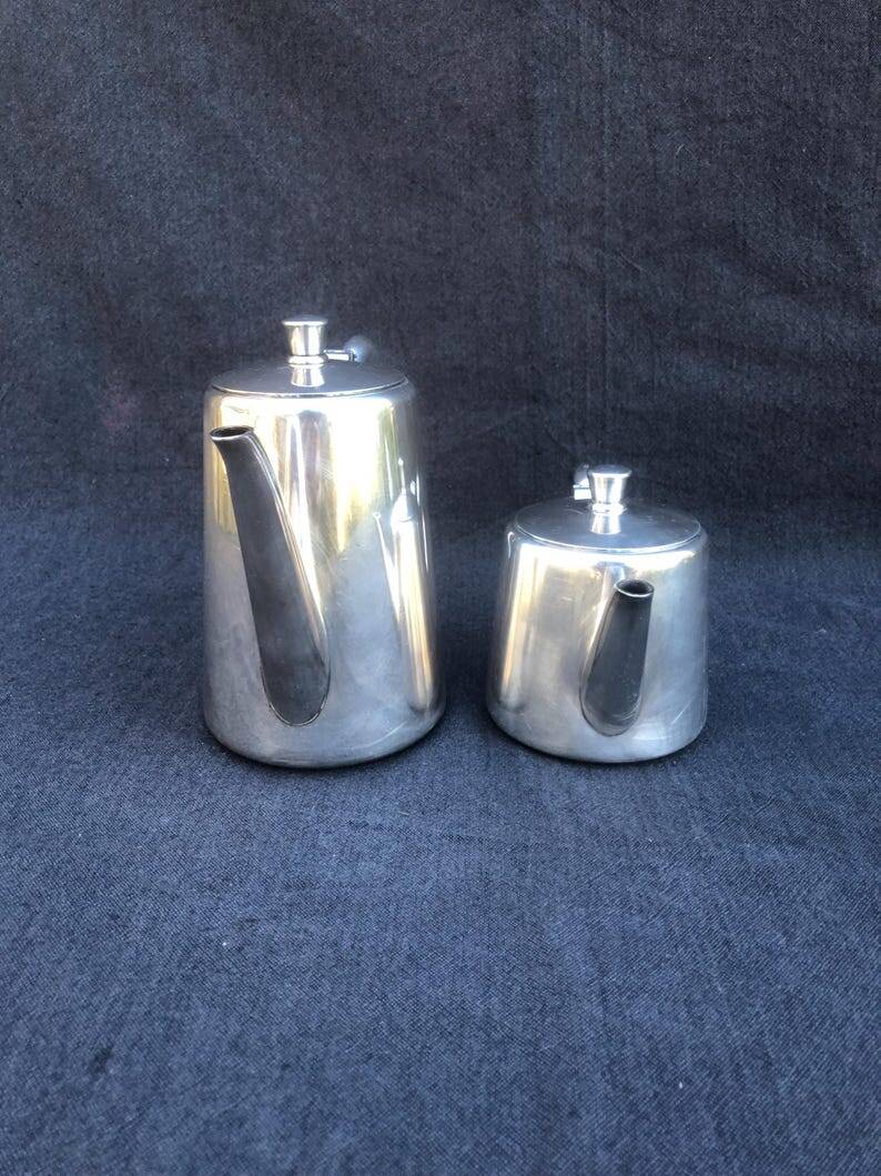 A pair of vintage silver-plated teapot and coffee pot