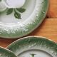 7 earthenware dessert plates with apple decoration and slip-brushed rim, KG Lunéville