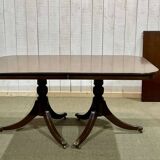 1950s English Regency walnut table with 1 extension leaf
